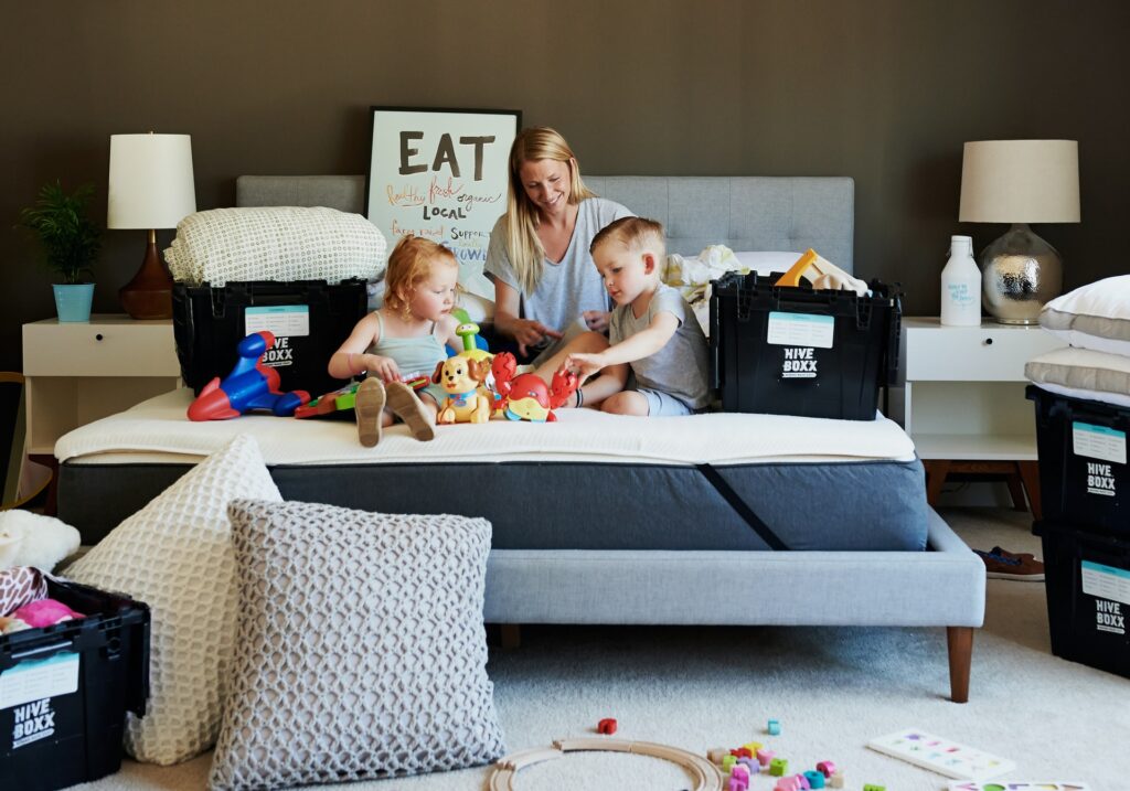 a mom with kids preparing for the move