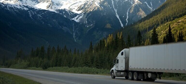 A moving truck on the road.