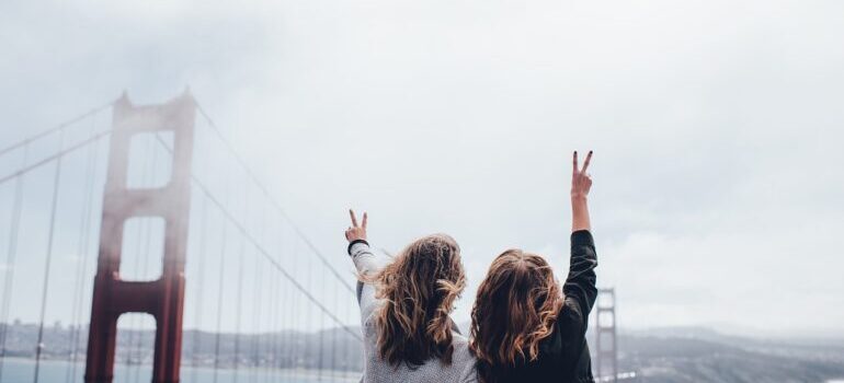 Two girls outside of the Golden Gate bridge.