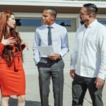 couple with real estate agent