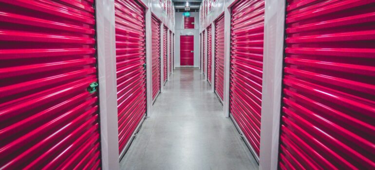 a storage facility interior with storage units on the side