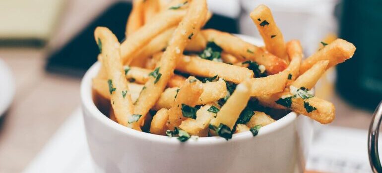A portion of French fries. 