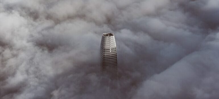 White tower in San Francisco covered by fog