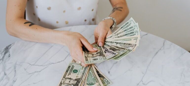 A woman counting money.