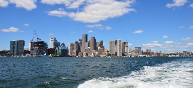 A view of Boston from a body of water.