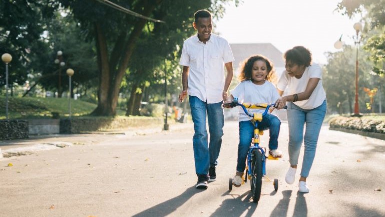 A family having fun outside.