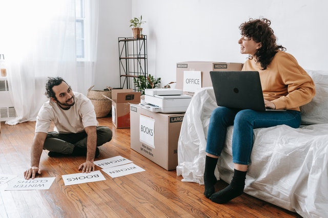 Couple preparing items for moving