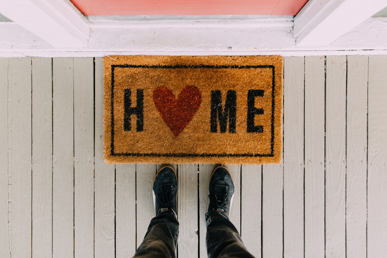 door mat with 'home' written on it