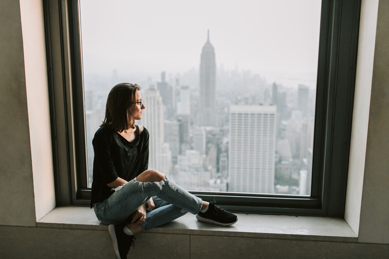 looking through a window after moving from Cleveland to NYC