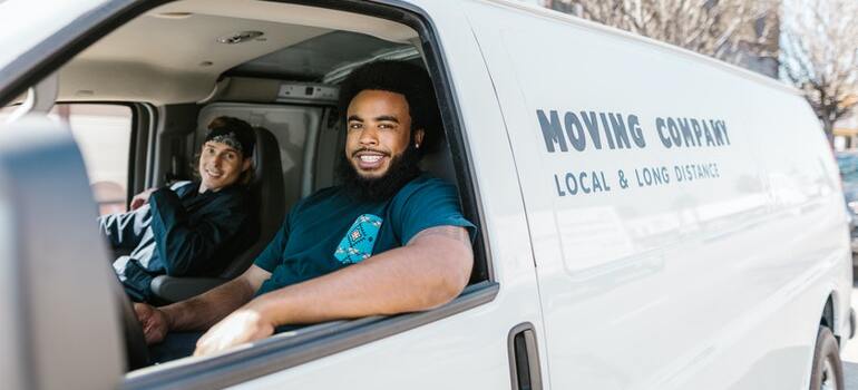 Movers sitting in a van