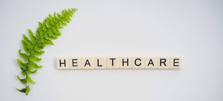 the word 'healthcare' spelled with letters on tiles