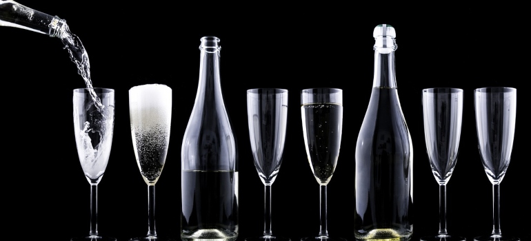 wine glasses and two wine bottles