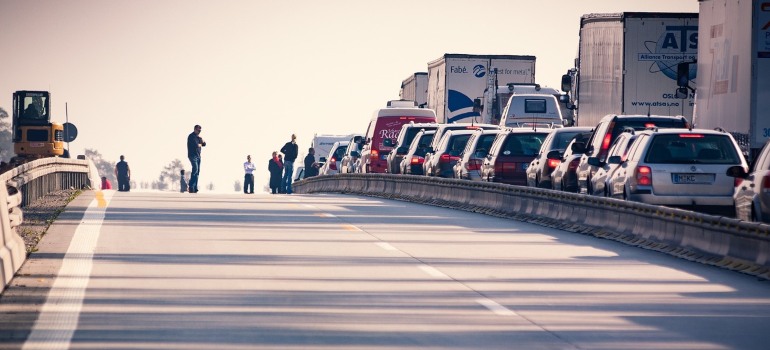 Cars and trucks on the road.