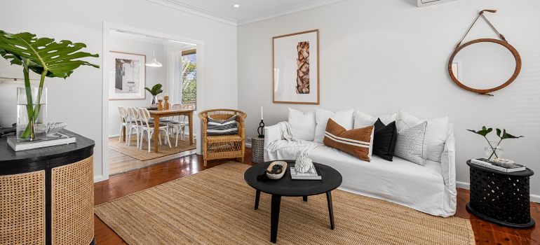 A living room with rattan details. 