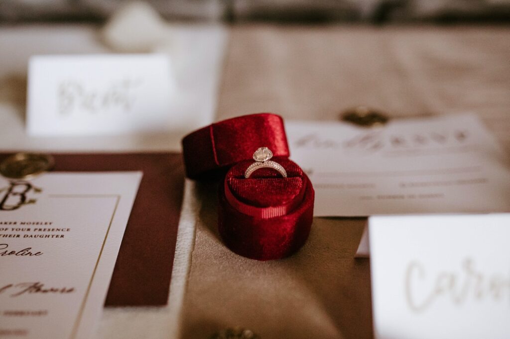 a ring in a red velvet box
