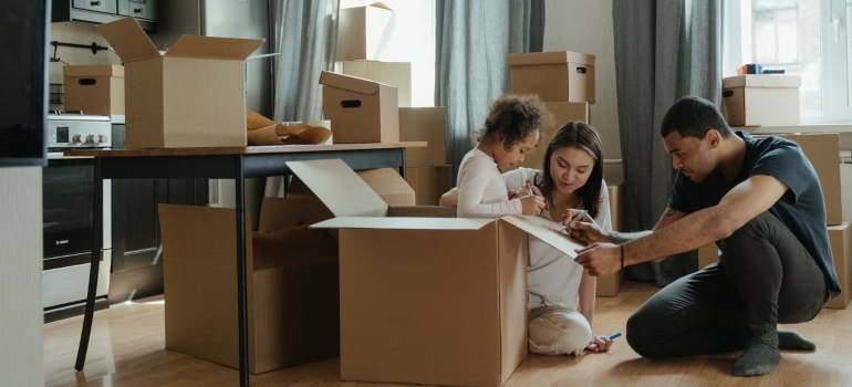 A family packing for moving on a budget
