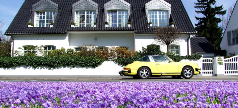 a house, car and flowers