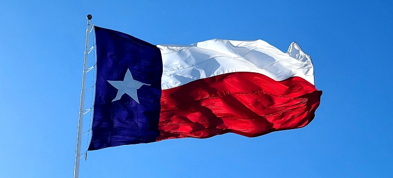 Texas flag in the air.