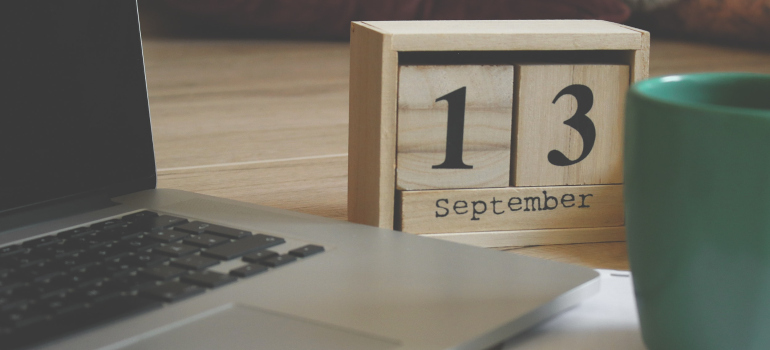 Brown calendar showing the date 13th September.