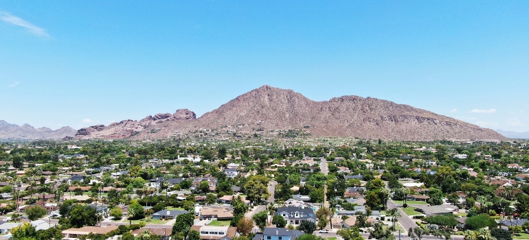 The city of Phoenix with a hill in the background.