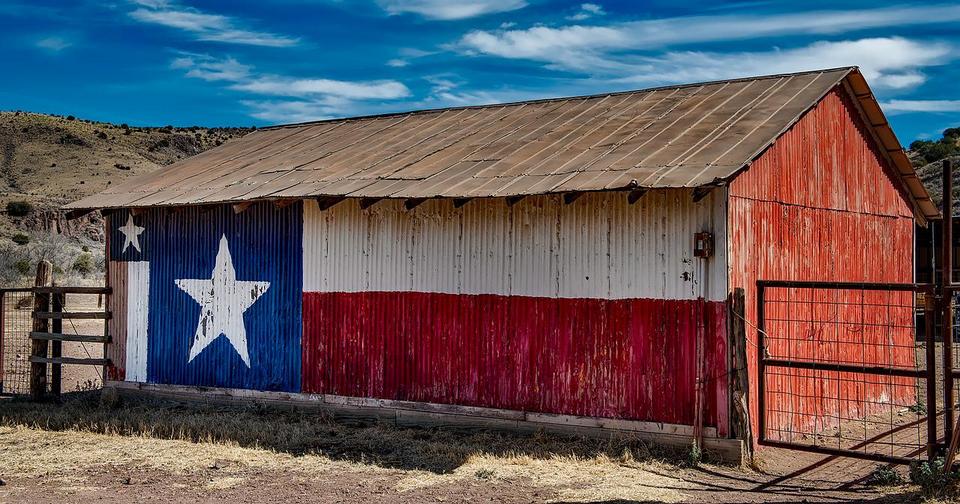 barn with texas flag painted on the side