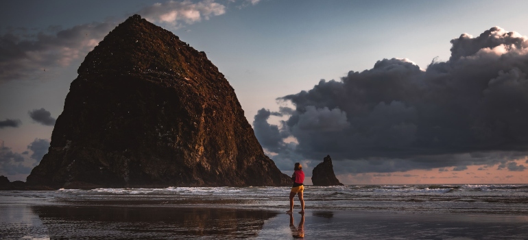 a woman at the Cannon Beach
