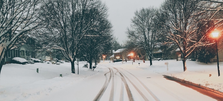 A photo of a snowy street in Maryland