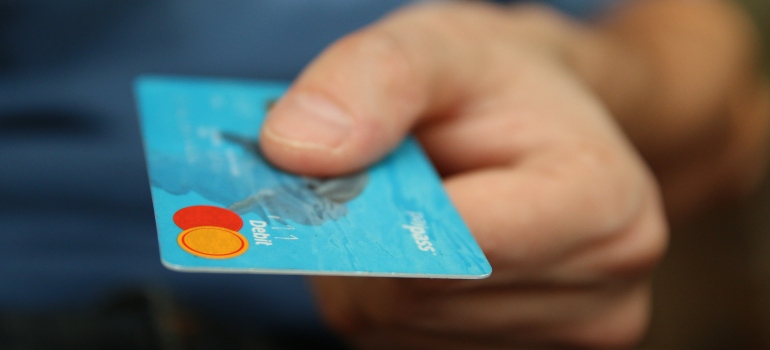 person holding a credit card
