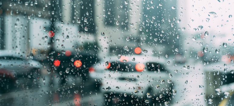 Car window with rain drops on it.