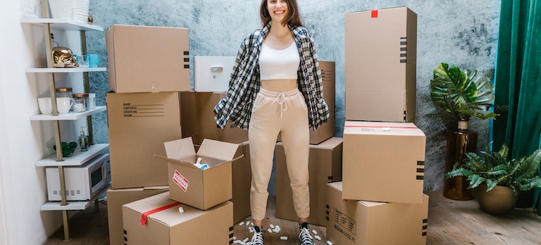 A woman happy for finding cross country moving companies Arlington Heights