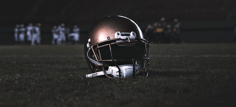 A photo of a helmet on a rugby field