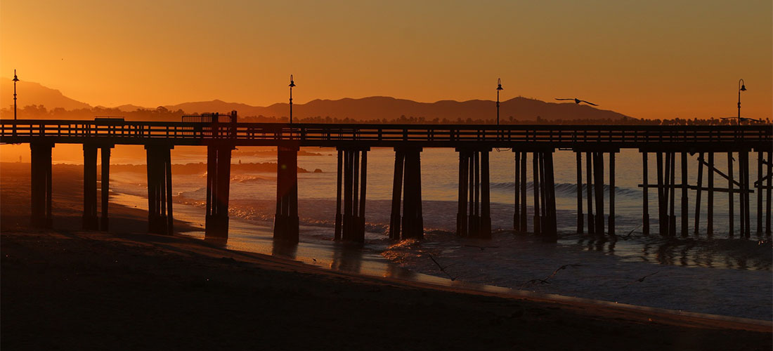 A pier in California during the sunset