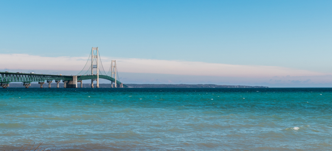 A photo of the Michigan Lake with the bridge in the distance