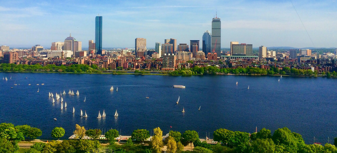 A waterfront photo of Boston, MA