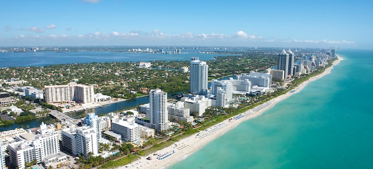 Aerial view of the beach in Magic City you'll be able to enjoy after moving from NYC to Miami.