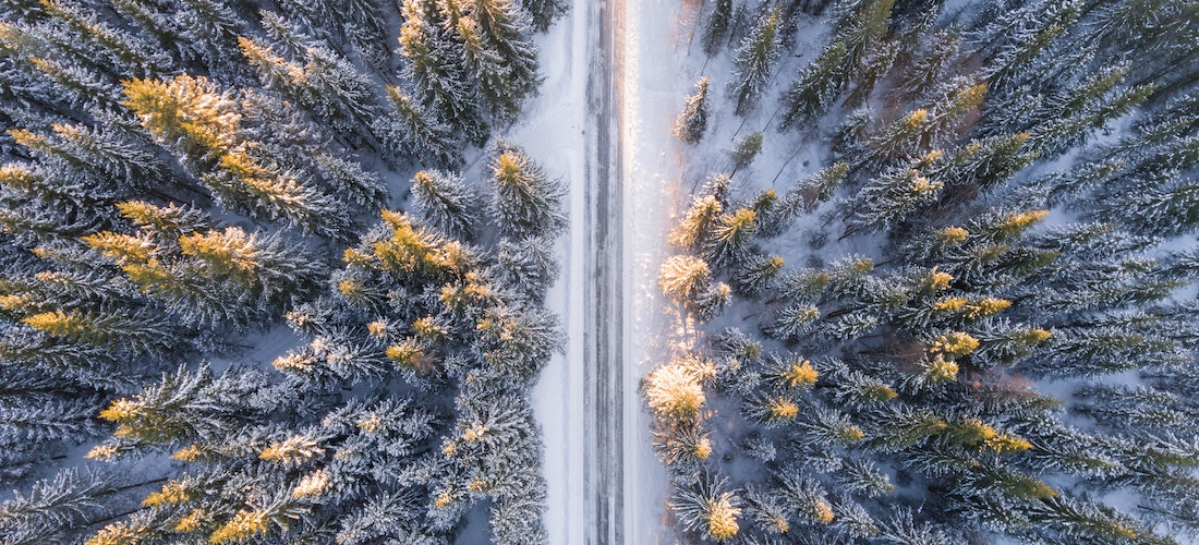 Aerial photo of a snowy road
