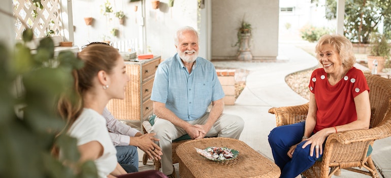 A group of people sitting and chatting