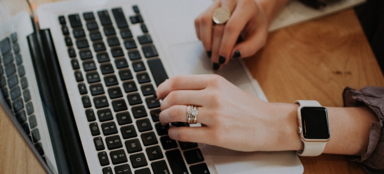 A woman researching everything she needs for moving to Japan from US.