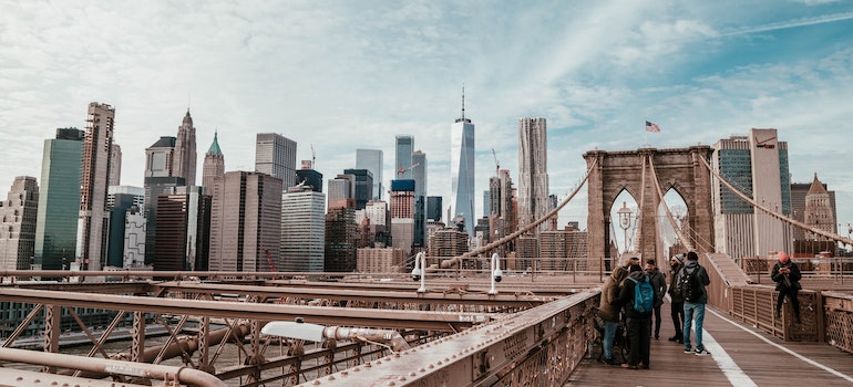 Bridge in New York with tourists taking photos