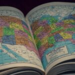 Open pages in an atlas with the United States map