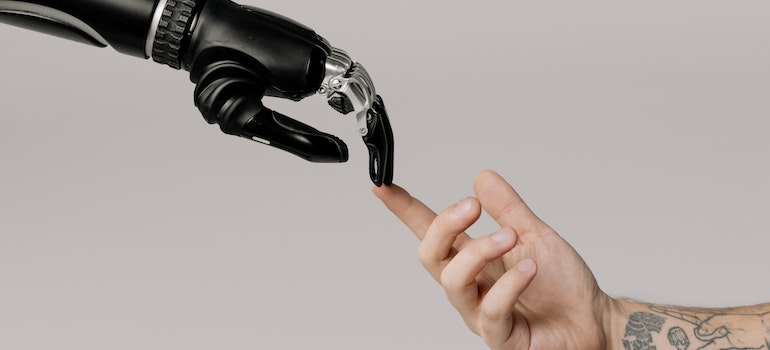 A robotic and human hand touching