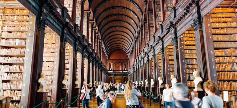 People visiting a big library in one of the best states for international students
