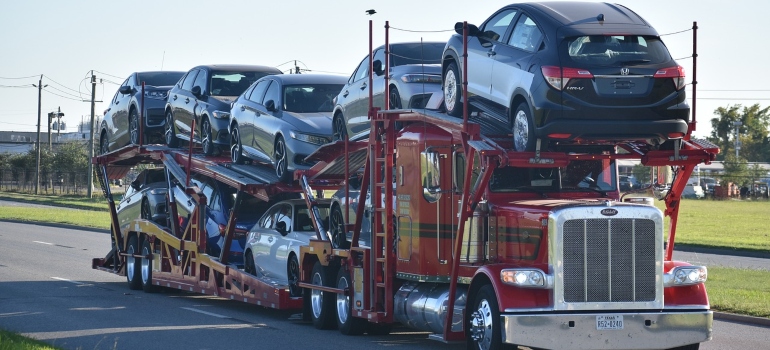 a car trailer transporting cars