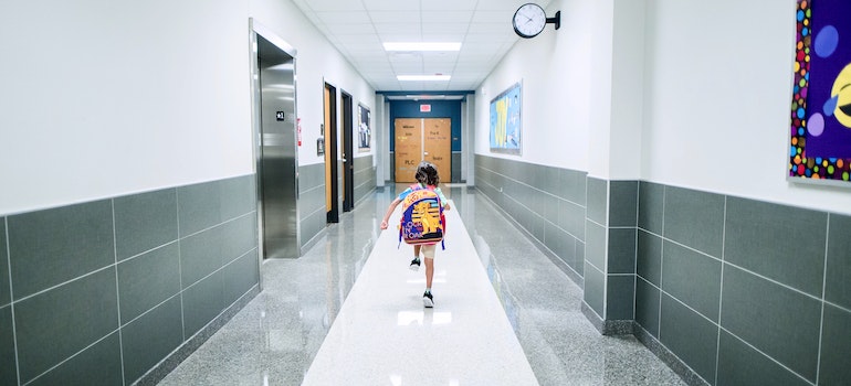 a kid running in school which is in one of the best places to live in Michigan