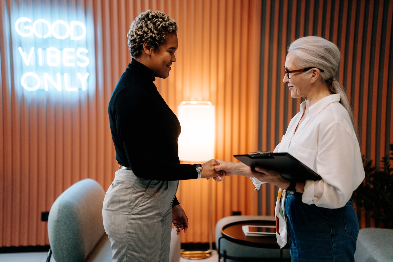 two women negotiating a corporate relocation package
