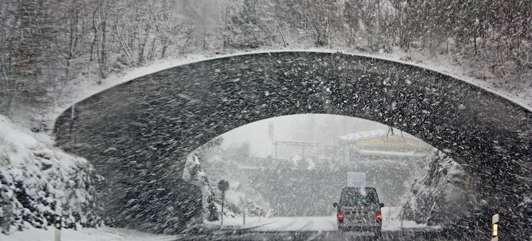 a car moving during extreme weather conditions