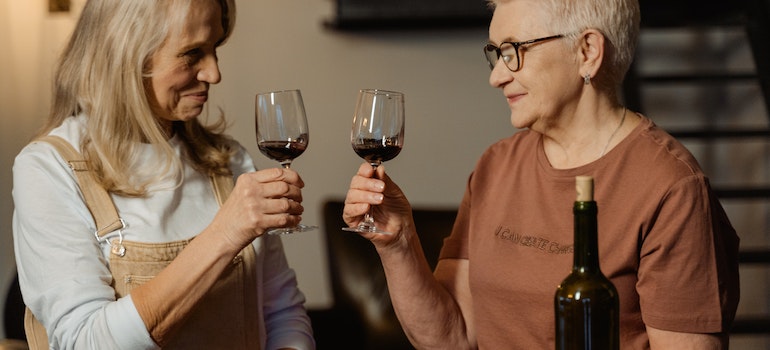 Old people drinking wine