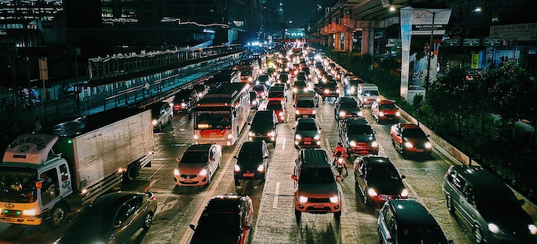 Many cars on a road during the night