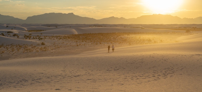People walking in a sunny desert in Nevada