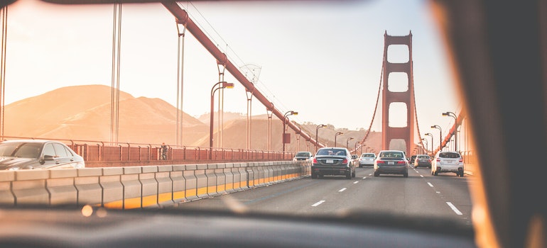 Photo from a car by a driver moving from Seattle to San Francisco over the Golden Gate bridge in early morning